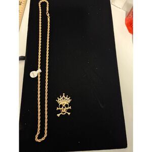 NEW 24" gold tone chain with lobster clasp and pendant -CROSSBONES